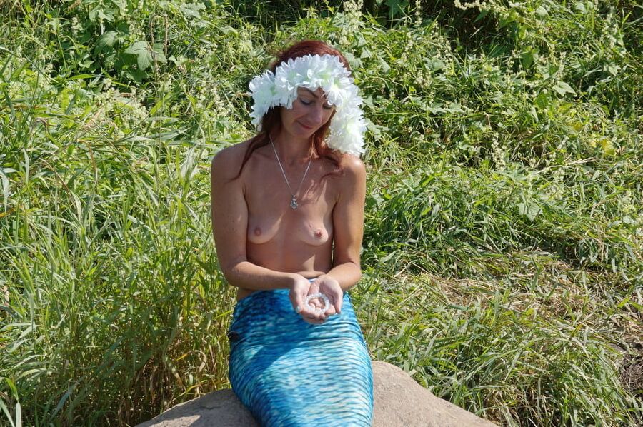 Mermaid on boulder