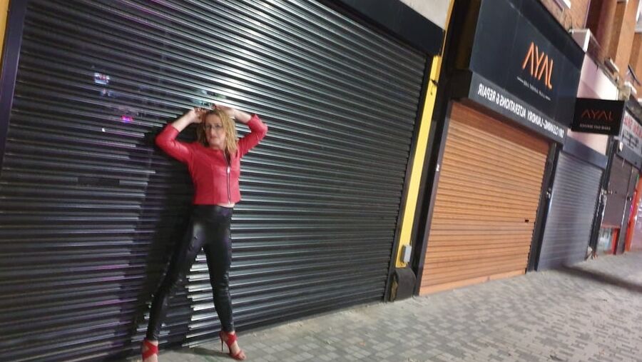 Leather clad street whore outside the sex club in London