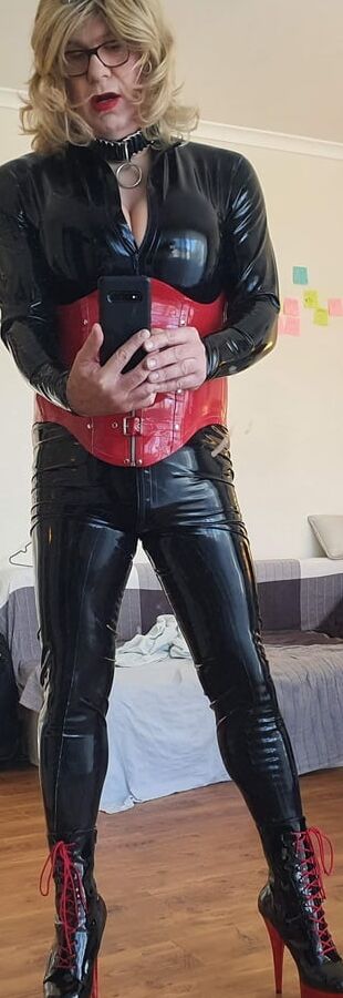 Rachel Wears a Catsuit and a Red Corset