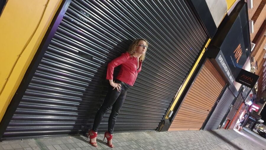 Leather clad street whore outside the sex club in London