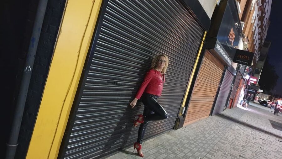 Leather clad street whore outside the sex club in London