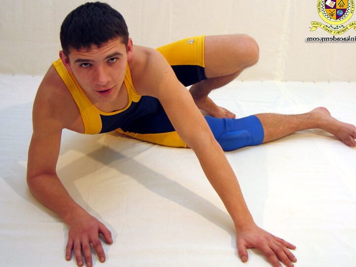Marty poses in and out of his wrestling singlet