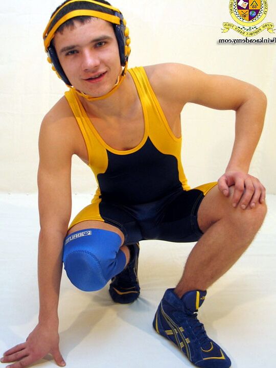Marty poses in and out of his wrestling singlet