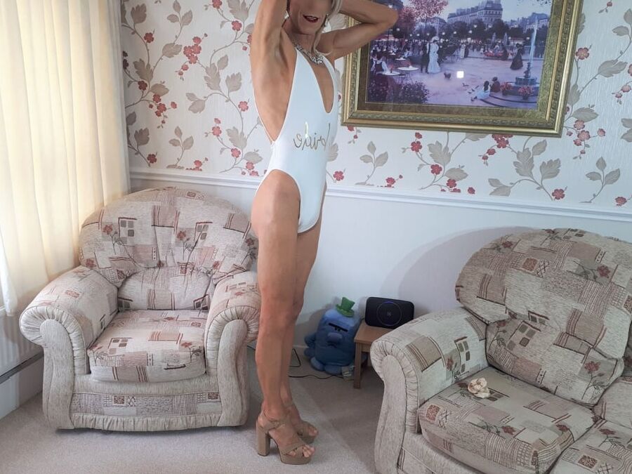Alessia models fun and sexy white Bride swimsuit