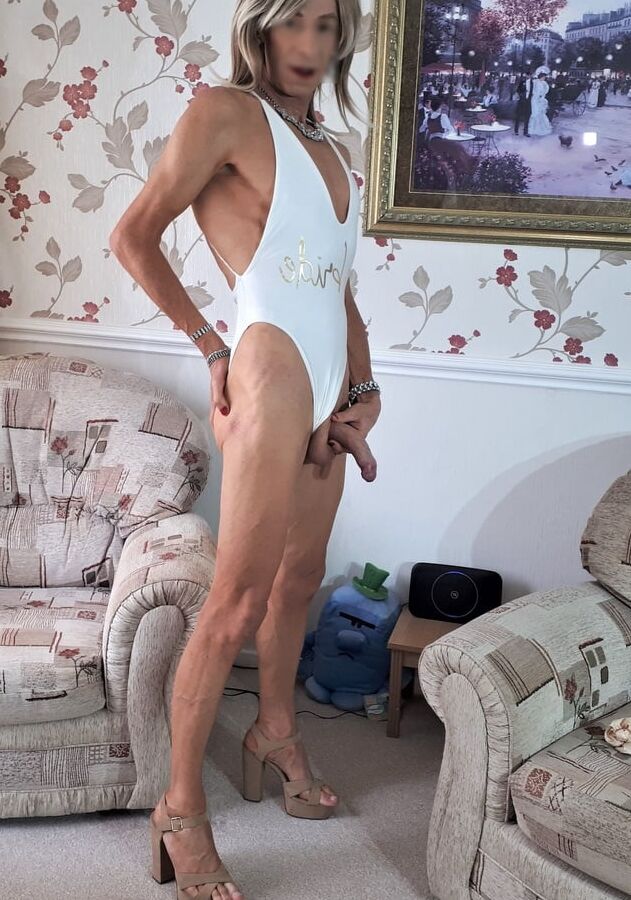 Alessia models fun and sexy white Bride swimsuit