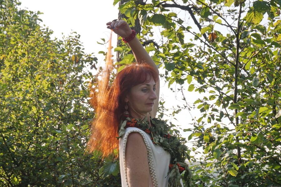 Flame Redhead near Lake