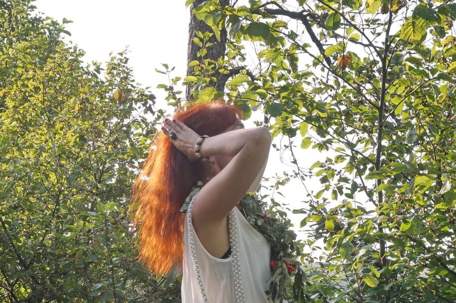 Flame Redhead near Lake