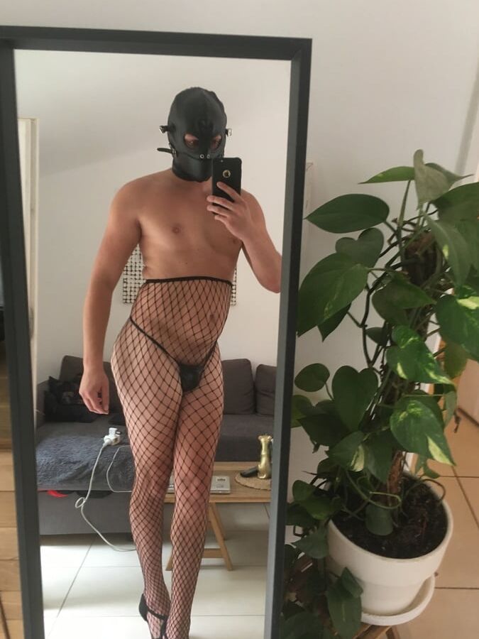 Vinyl, fishnet, hood and ball gag