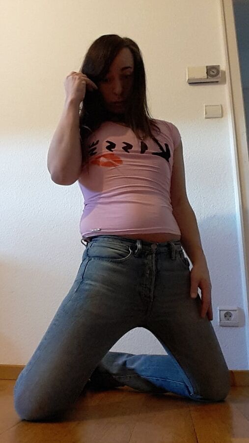 Tygra undresses and shows off her big t girl cock.