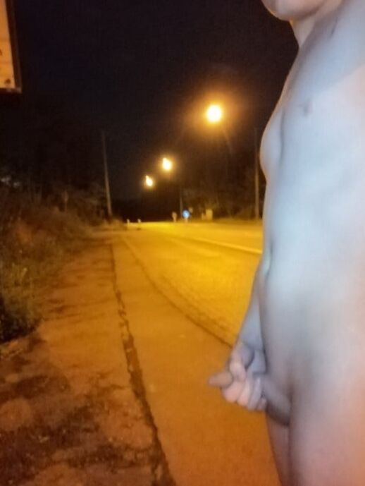 Naked at the bus stop at night
