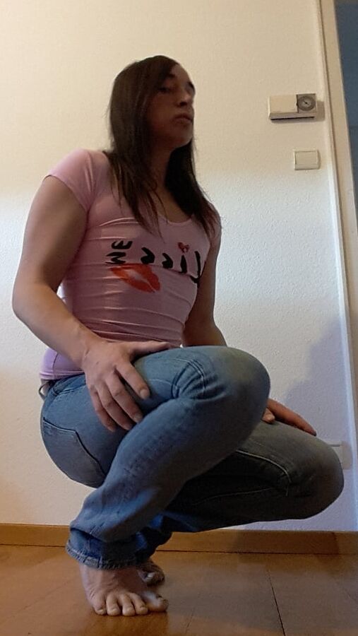 Tygra undresses and shows off her big t girl cock.