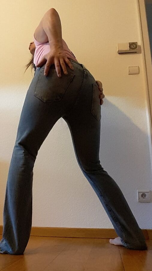 Tygra undresses and shows off her big t girl cock.