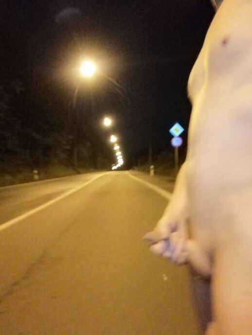 Naked at the bus stop at night