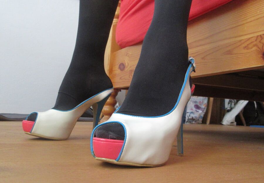 my wifes long legs with patent high heels