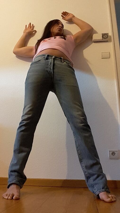 Tygra undresses and shows off her big t girl cock.