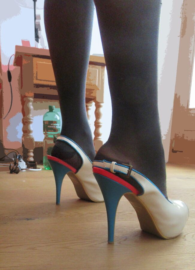 my wifes long legs with patent high heels