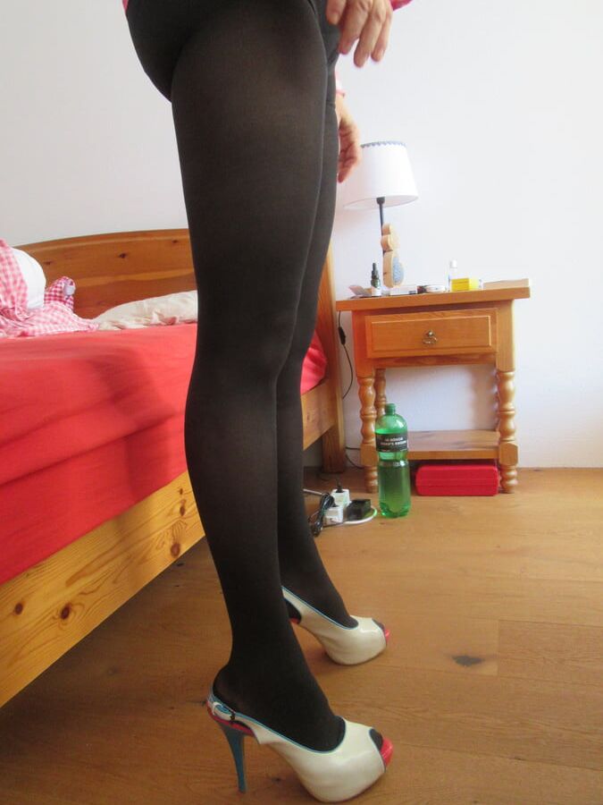 my wifes long legs with patent high heels