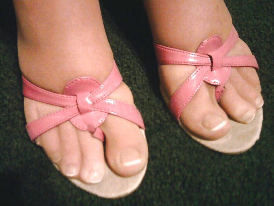 my wifes feet with long red nails