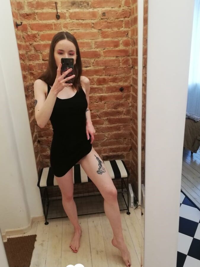 Checking out my new tattoo while naked