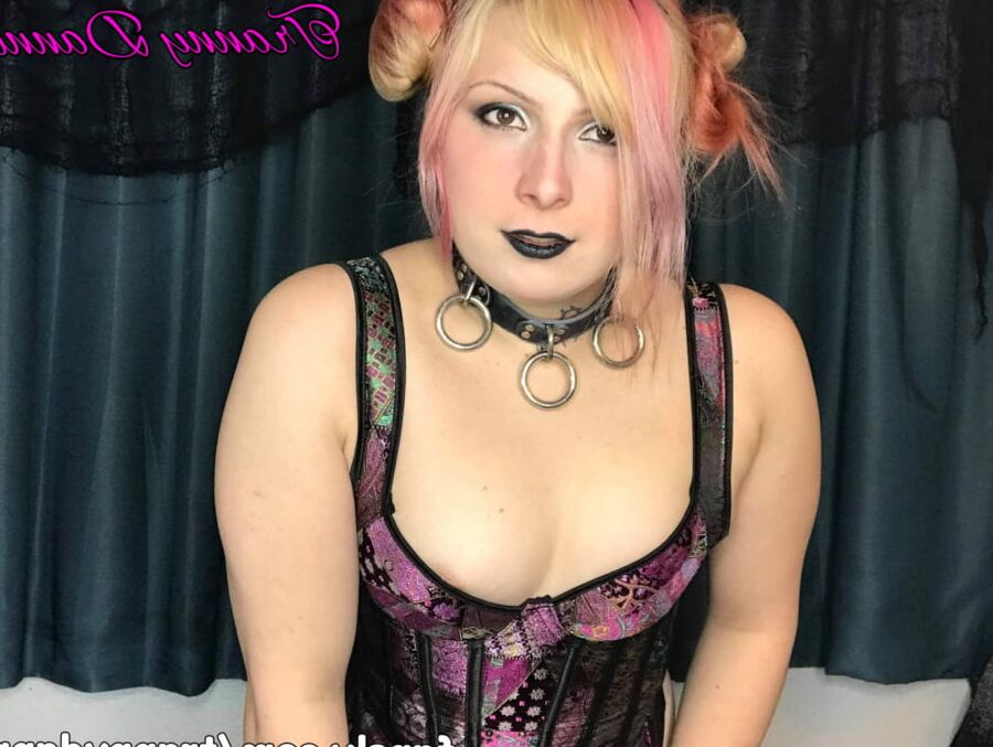 Sexy Tranny Danni poses for the camera