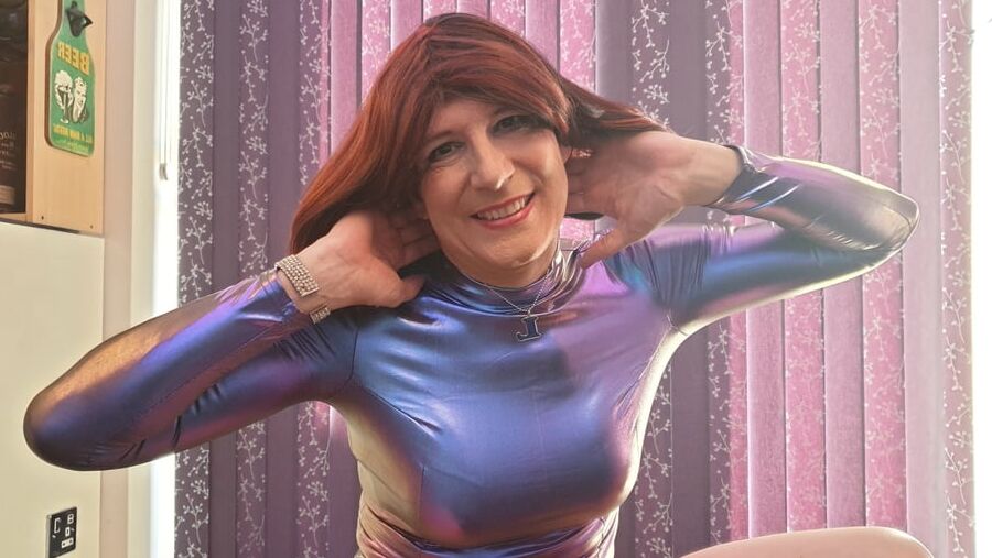 Sissy Lucy showing off in metalic bodycon dress and chastity