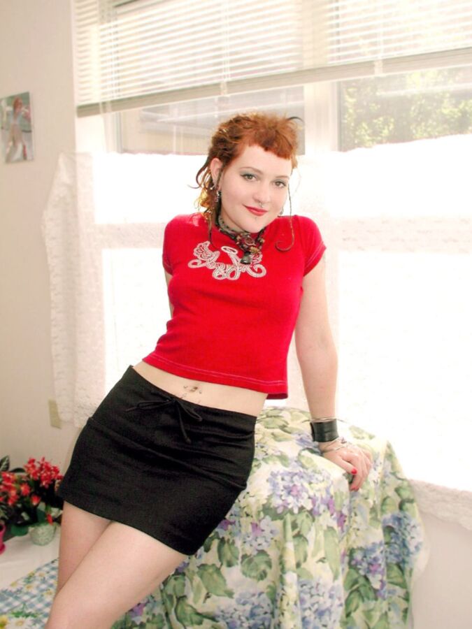Cute Young Redhead Chick in a Yellow Shirt