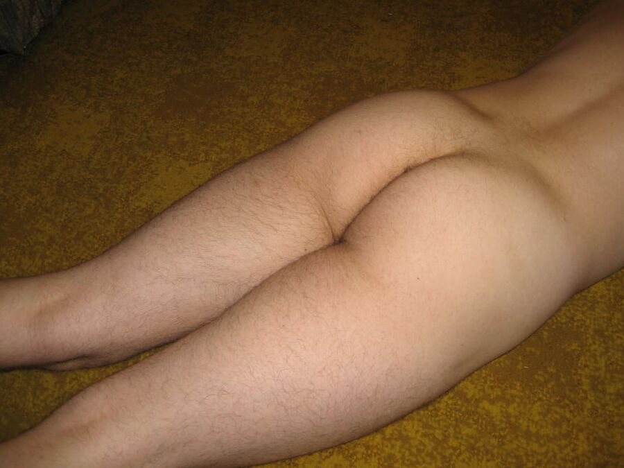 Young naked ass on display