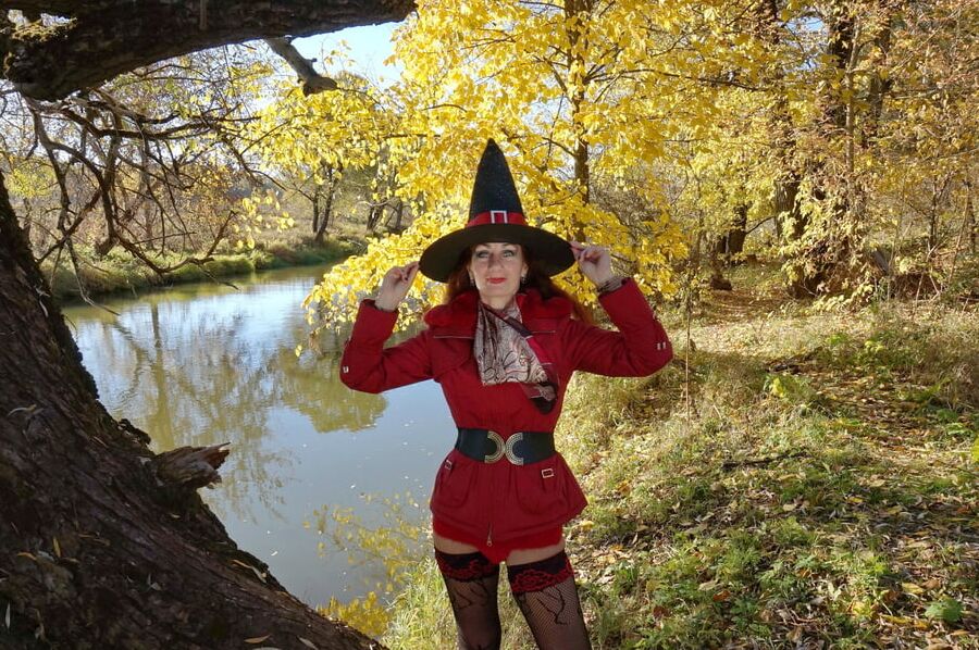 In Hat on Yellow Leaves Background