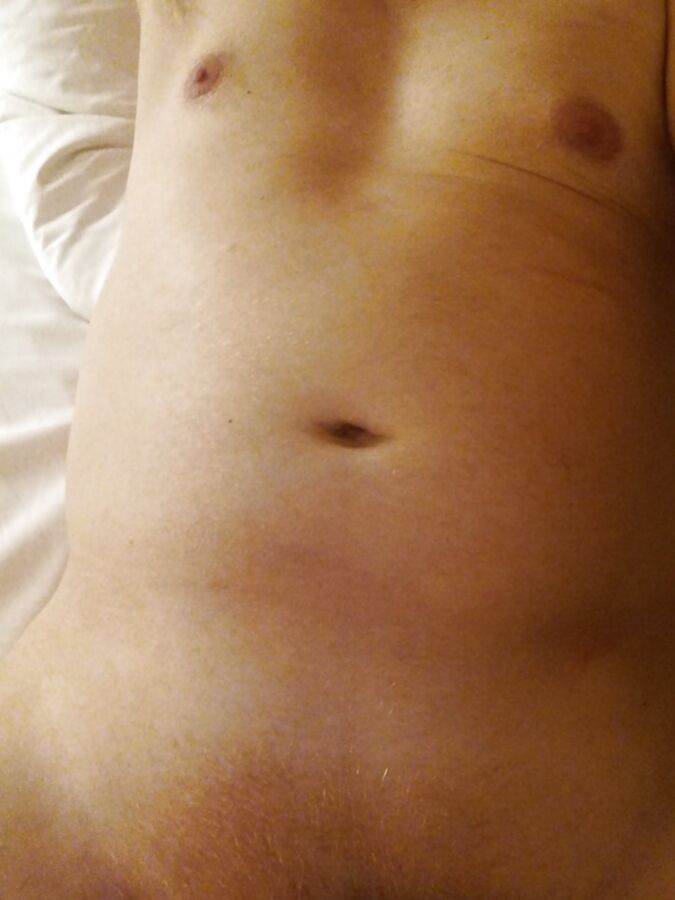 Nude (but covered) on hotel bed