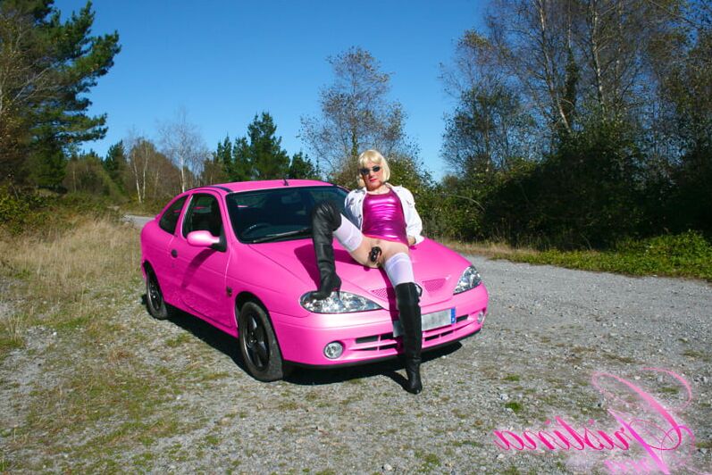 Slutty sissy in a photoshoot with her car...
