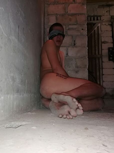 Slave body writing in dirty basement. Humiliation comment