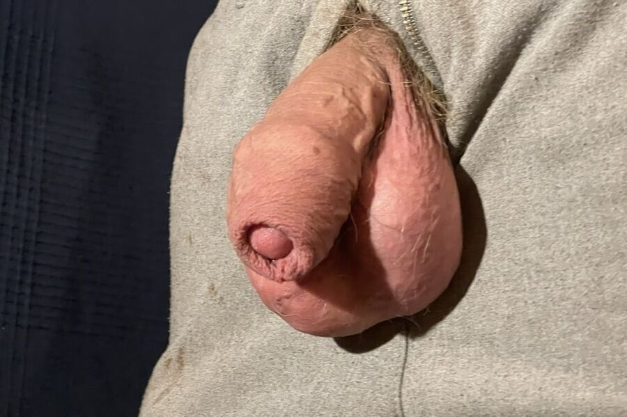 Thick uncut Russian cock hangs out of zipper