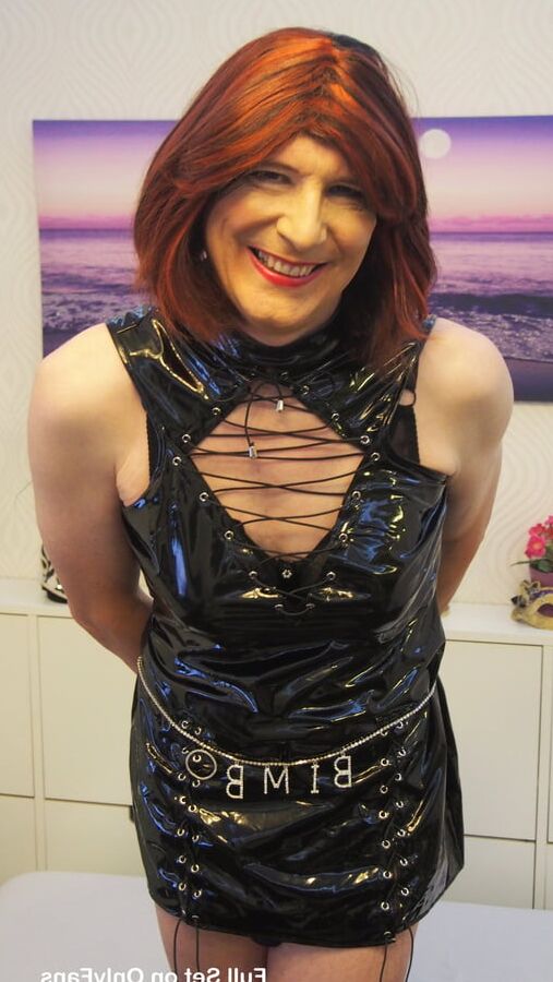 Sissy Lucy showing off in PVC dress and chastity