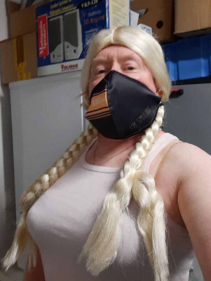 Ginger crossdresser wears bra