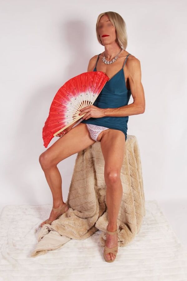 Alessia models turquoise bodycon micro-dress in fun shoot