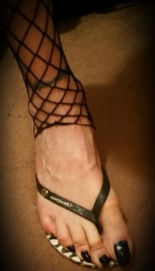 Asian ts Black toenails and fishnet