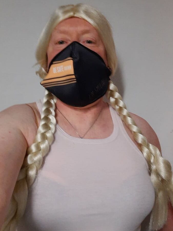 Ginger crossdresser wears bra