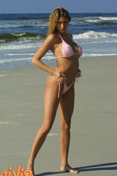Julia V Earth in red bikini at the beach