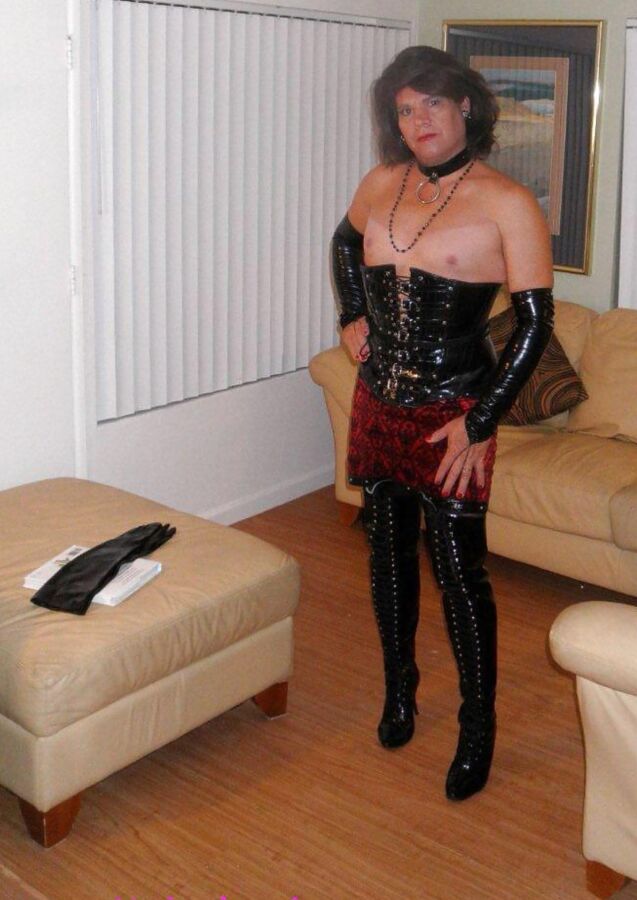 Miss Christi in various corsettes and school girl uniform