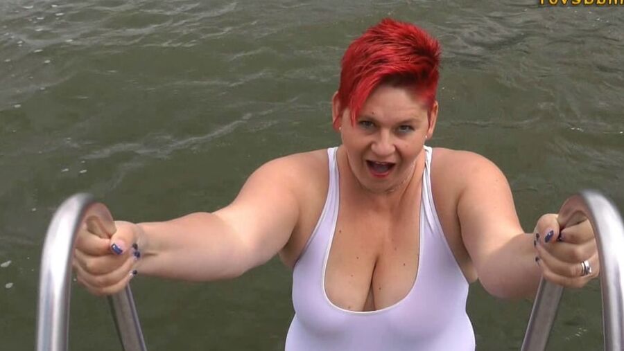 In WHITE SWIMSUIT in the lake