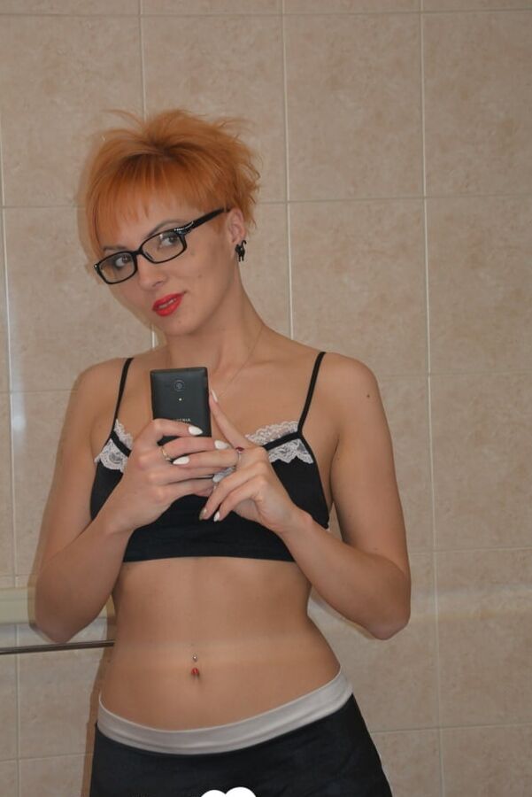 Redhead MILF with glasses will get you excited