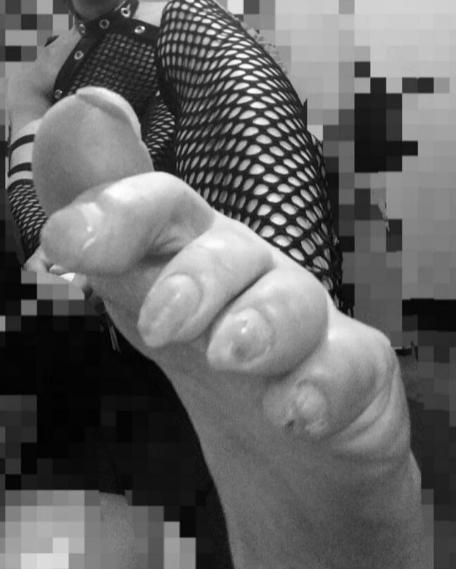 a dark mistress long toenails