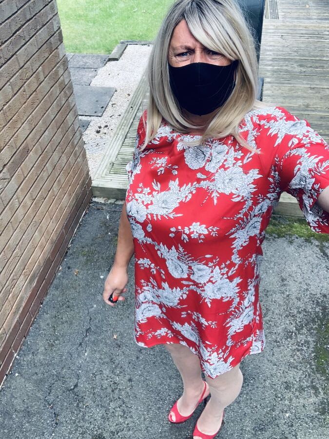 Kelly in red dress and nude fishnets