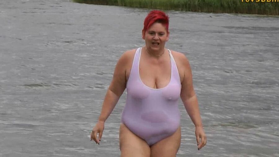 In WHITE SWIMSUIT in the lake