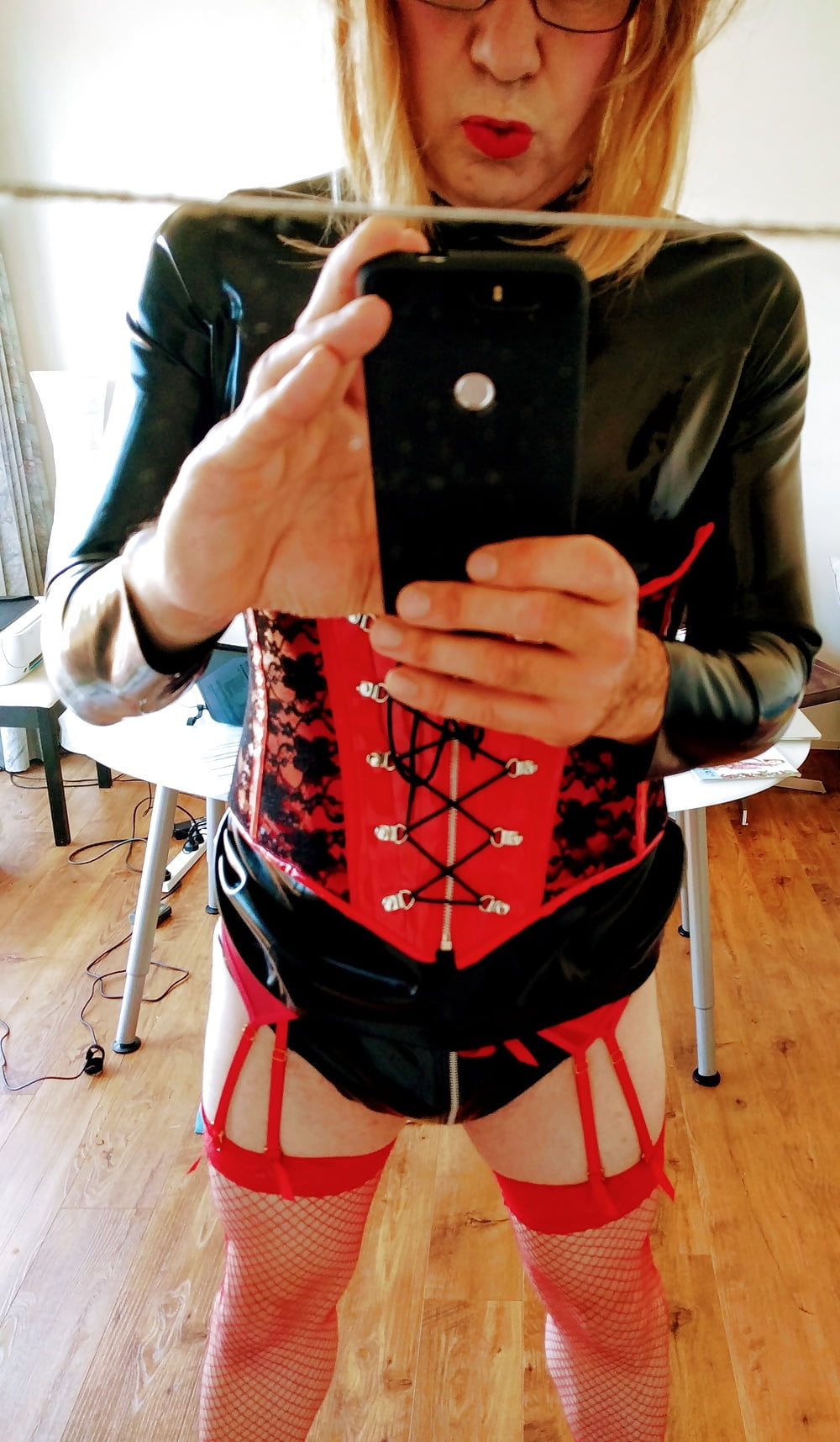 Red fishnets and hot corset combo