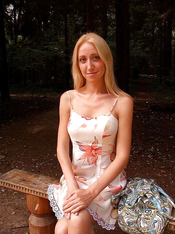 Bondaged blonde slave portured in the forest