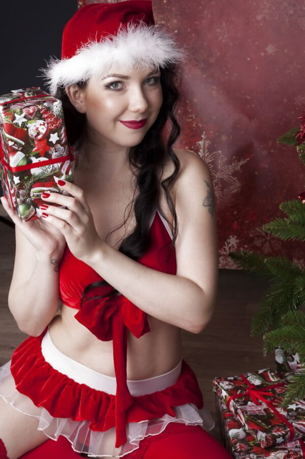 Merry Christmas. Daphne Angel as sexy Santa Girl.
