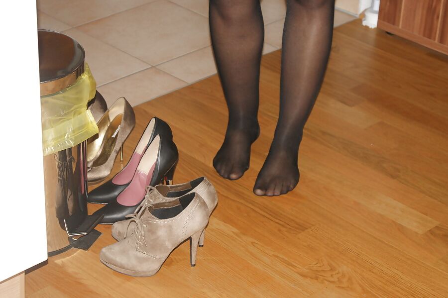 studded high heels of my wife with painted toenails