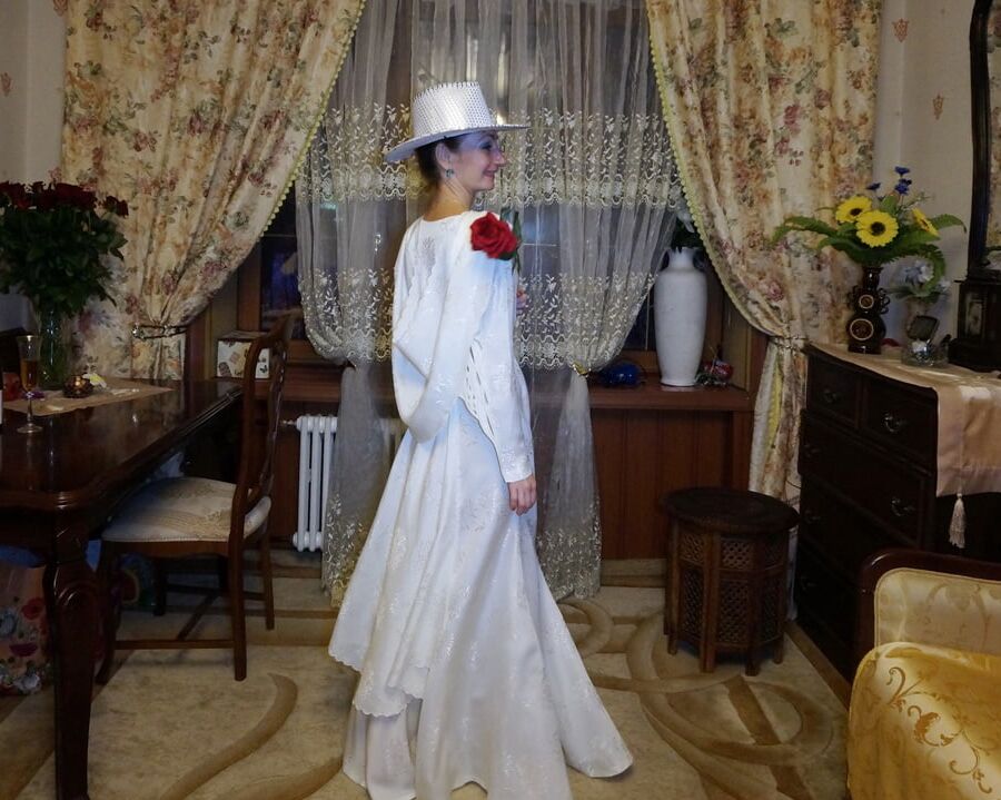 In Wedding Dress and White Hat
