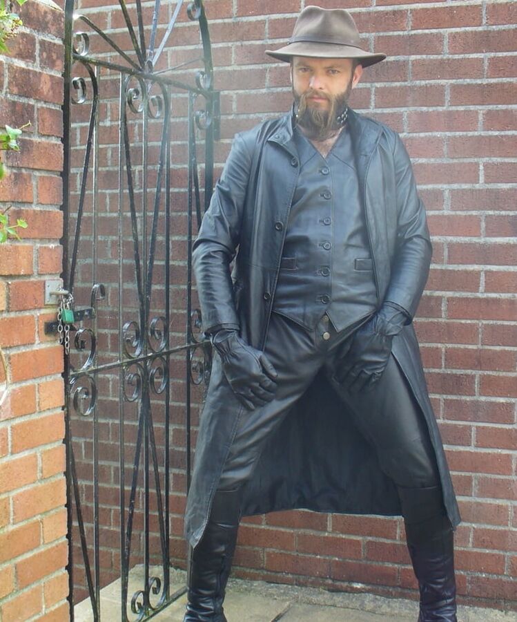 Leather Master outdoors in leather coat and boots